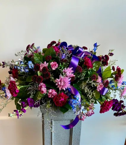 Purple Harmony Casket Spray